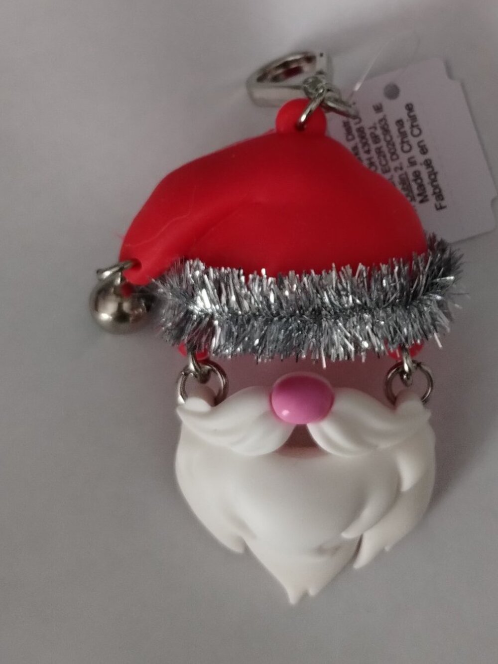Bath - n- body Santa key chain holder( holds a pocket bac hand sanitizer)